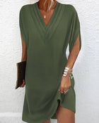 Robe élégante à manches fendues de couleur unie