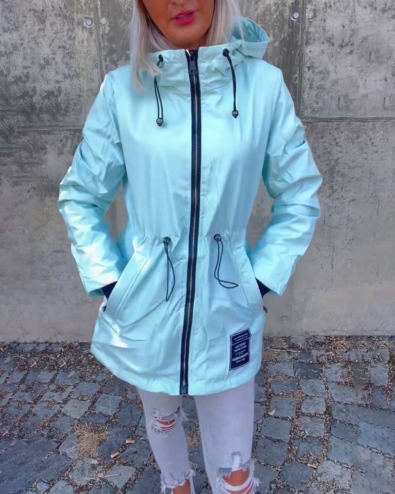 Manteau à fermeture éclair et cordon de serrage
