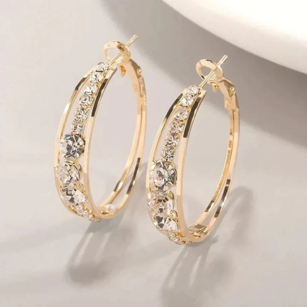 Boucles d'oreilles créoles brillantes élégantes