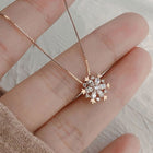 Collier en cristal avec flocon de neige brillant en or et en argent