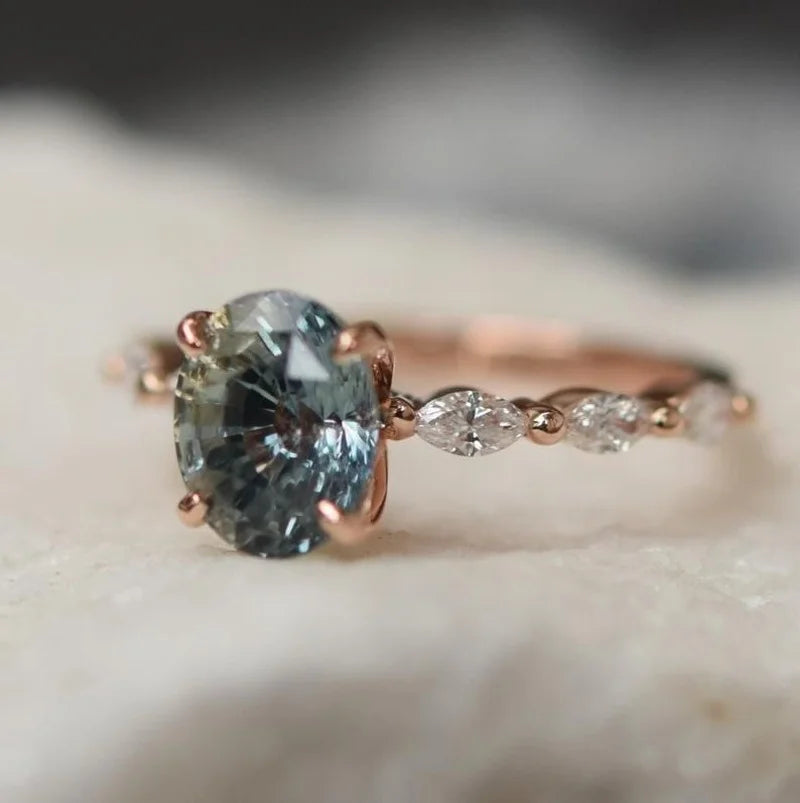 Bague vintage en or rose avec saphir