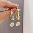 Boucles d'oreilles charmantes avec des perles