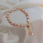 Bracelet de perles roses en or