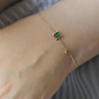 Bracelet en or avec cristal vert