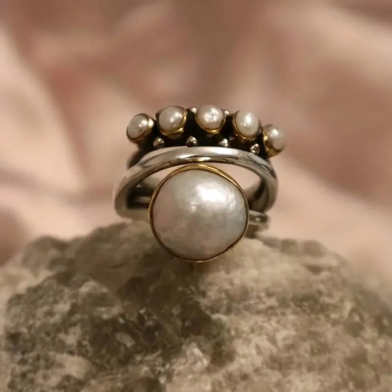 Bague vintage avec couronne en argent et perles