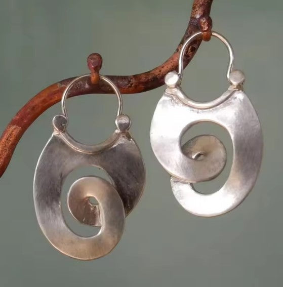 Boucles d'oreilles vintage en argent avec spirale