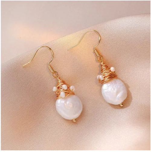 Boucles d'oreilles rétro avec perles d'eau douce en format spécial