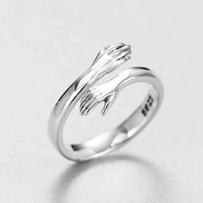 Bague ajustable type étreinte en argent