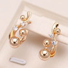 Boucles d'oreilles rondes dorées élégantes avec zircon
