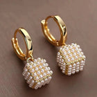 Boucles d'oreilles élégantes avec perles cubiques