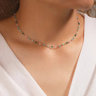 Collier avec des pierres multicolores dorées