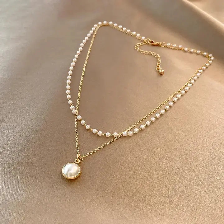 Collier élégant en perles d'or