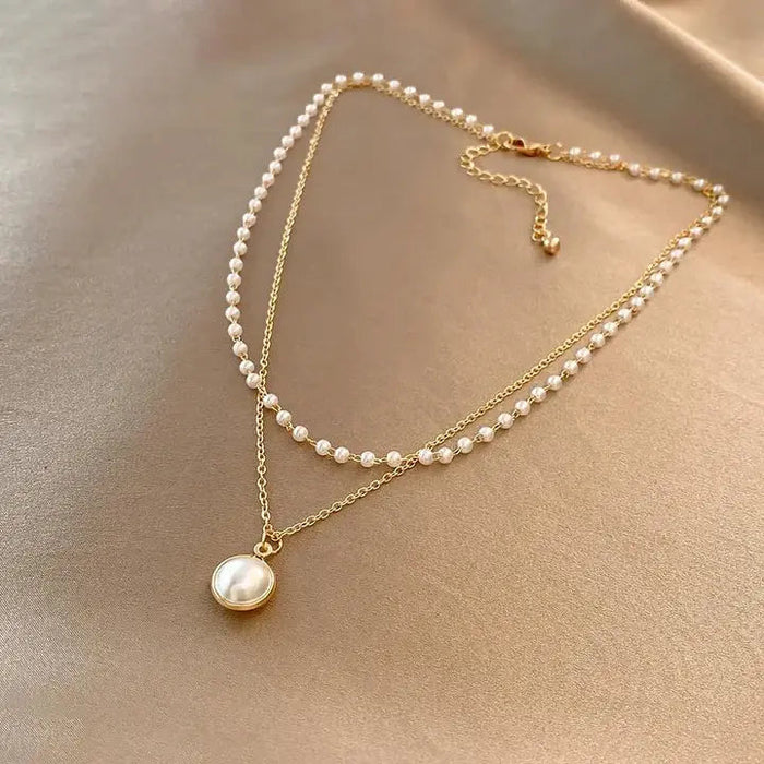 Collier élégant en perles d'or