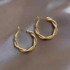 Boucles d'oreilles élégantes en or avec nœud
