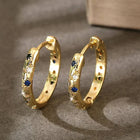 Boucles d'oreilles vintage dorées avec un éclat intense