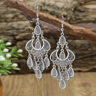 Boucles d'oreilles anciennes en argent avec pendentif
