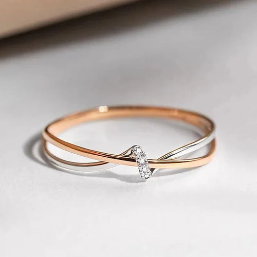 Bague entrelacée en or rose et en argent