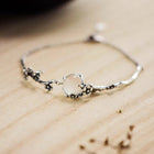 Bracelet vintage en argent avec bouquet de fleurs