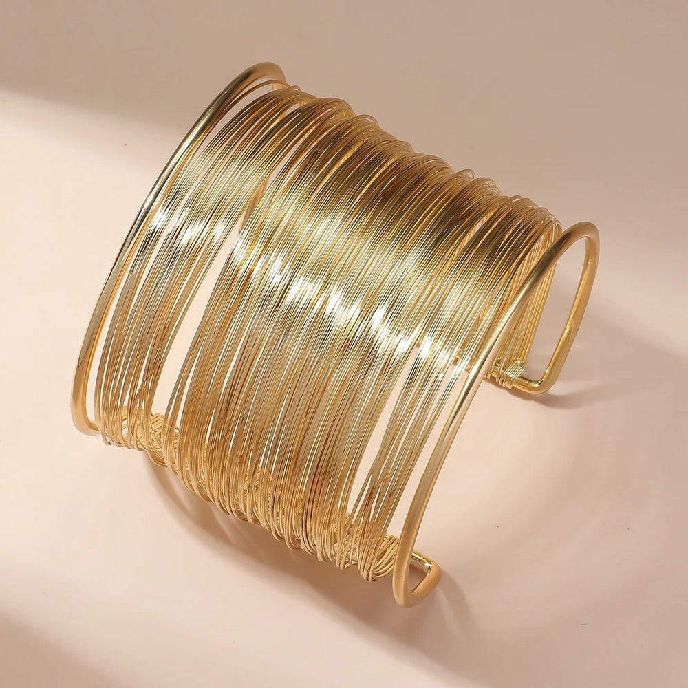 Bracelet ouvert avec spirale en or