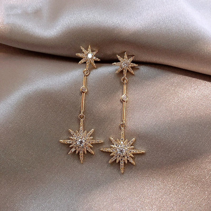 Boucles d'oreilles vintage en or avec étoile en cristal