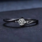 Bague vintage en or noir avec cristal