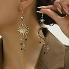 Boucles d'oreilles vintage avec soleil et lune suspendus