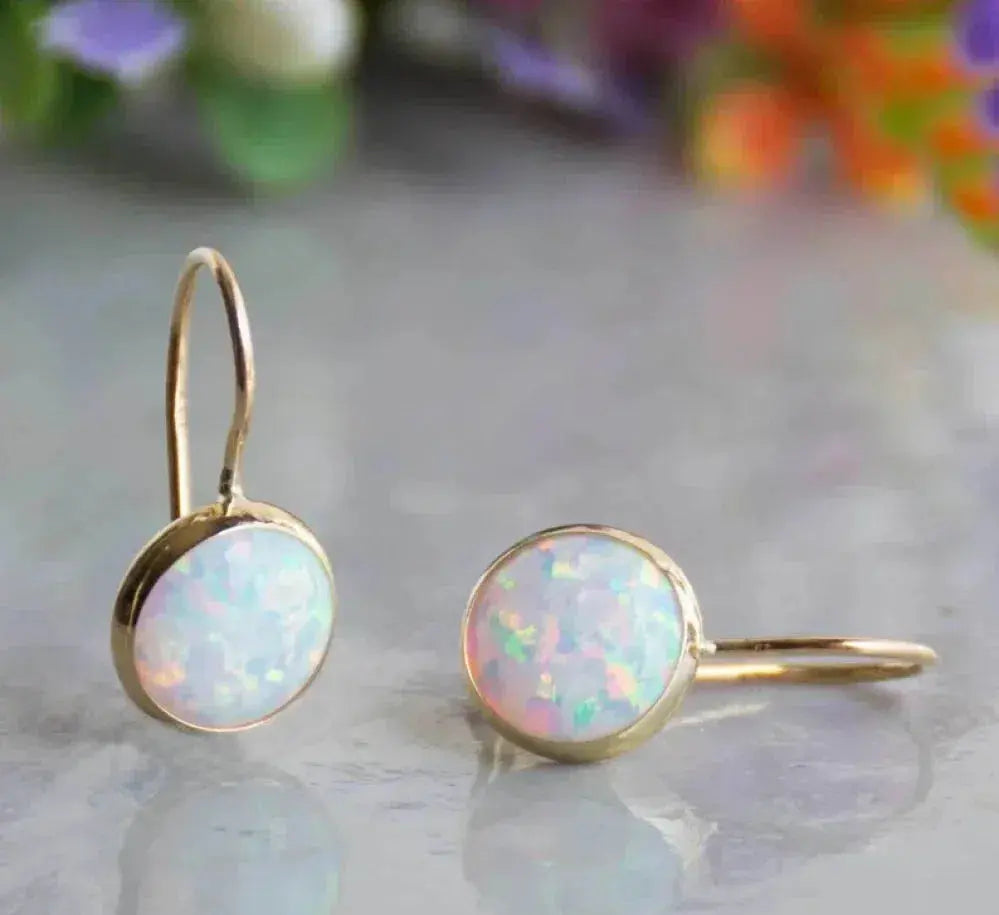 Boucles d'oreilles vintage en or avec pierre d'opale