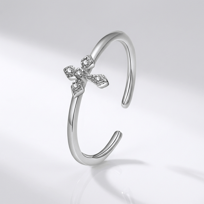 BAGUE BRILLANTE EN CROIX ARGENTÉE