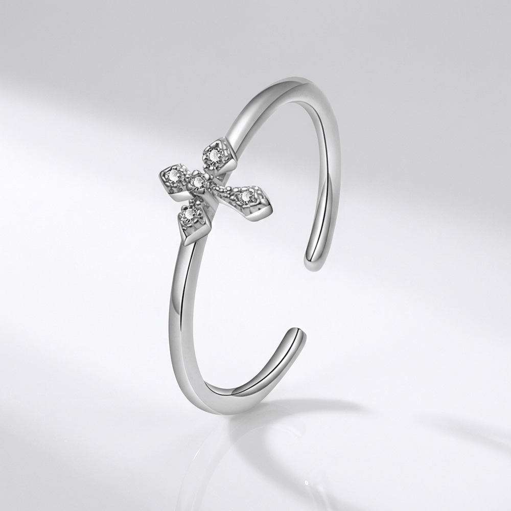 BAGUE BRILLANTE EN CROIX ARGENTÉE