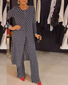Costume élégant fendu à pois
