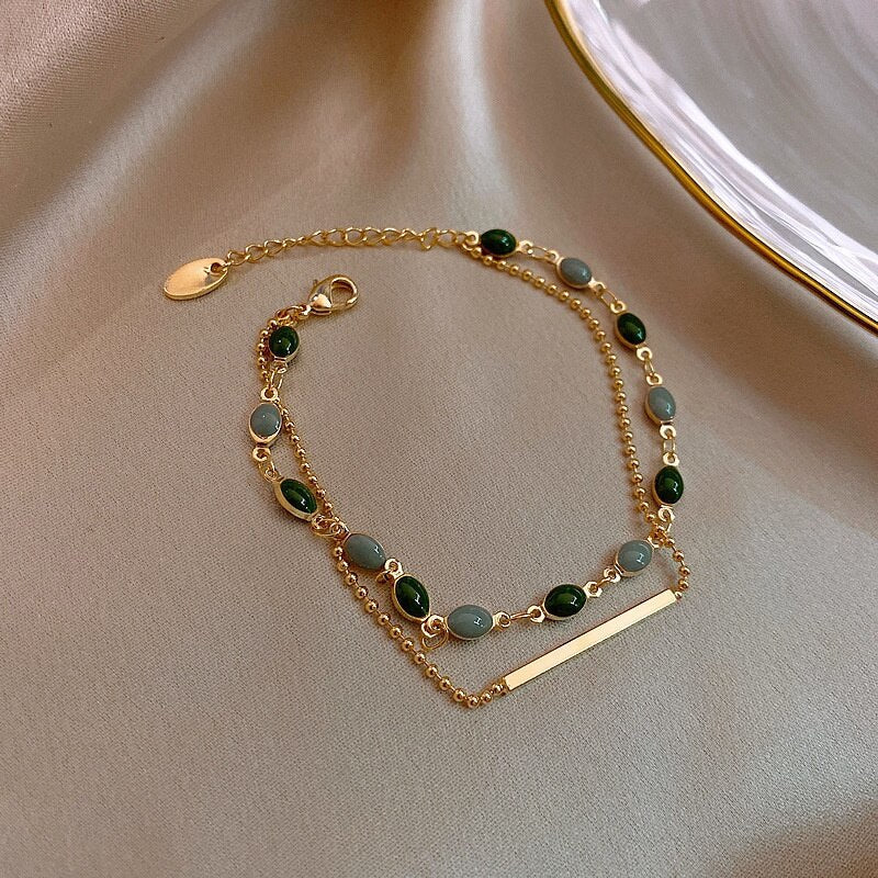 Bracelet double avec charms