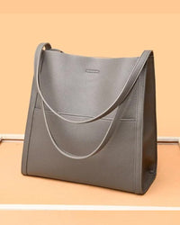 Sac à bandoulière simple de couleur unie