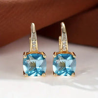 Boucles d'Oreilles en Or avec Pierres Mystérieuses