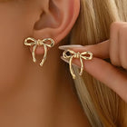 Paire de boucles d'oreilles élégantes avec nœud en ruban