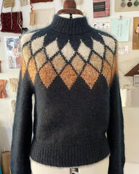 Pull à jacquard losange géométrique