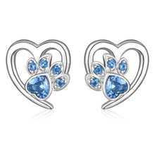 Boucles d'oreilles avec patte et cœur en zircon