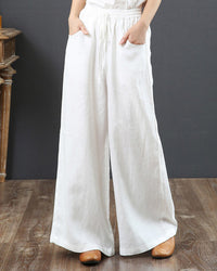Pantalon large taille haute de couleur unie
