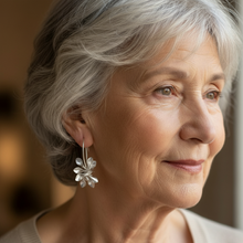 Boucles d'oreilles vintage en argent avec des fleurs irrégulières