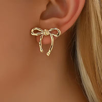 Paire de boucles d'oreilles élégantes avec nœud en ruban