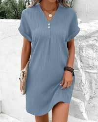 Robe col V de couleur unie