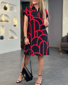 Robe midi imprimée à manches courtes et ligne de revers