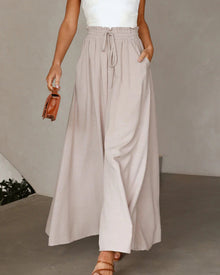 Pantalon taille haute de couleur unie