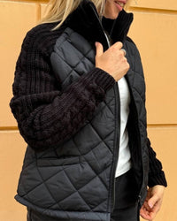 Manteau zippé à col haut de couleur unie