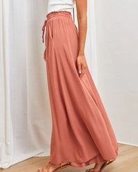Pantalon taille haute de couleur unie