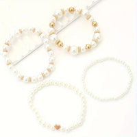 Ensemble de bracelets en perles blanches