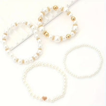 Ensemble de bracelets en perles blanches