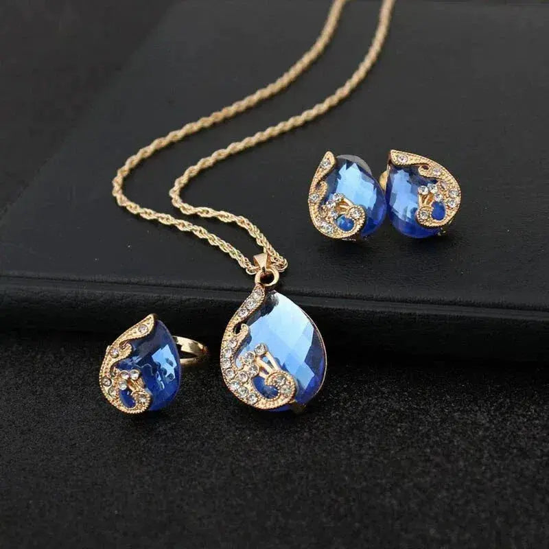 Ensemble de collier et boucles d'oreilles en cristal bleu avec doré
