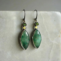 Boucles d'oreilles vintage avec pierre verte