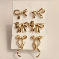 Paire de boucles d'oreilles élégantes avec nœud en ruban