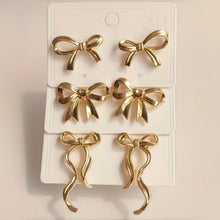 Paire de boucles d'oreilles élégantes avec nœud en ruban